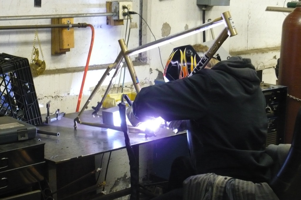 Paul welding the ISCG plate on the Inbred. 