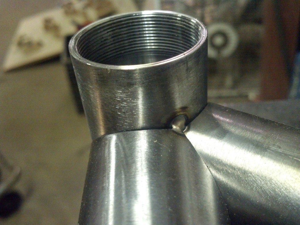 Bottom bracket compound junction tack welded together
